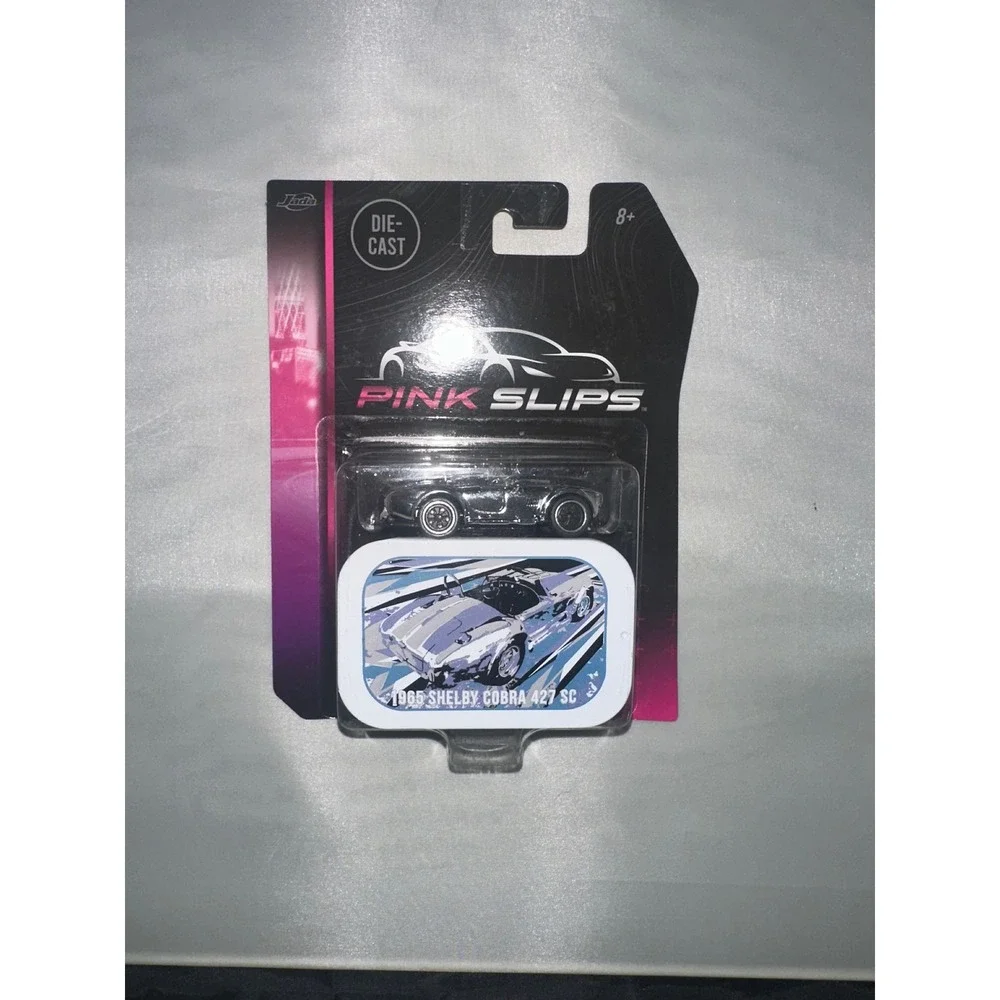 Jada Pink Slips 1965 Shelby Cobra 427 SC Chrome 1:64 Die-Cast Car with Tin